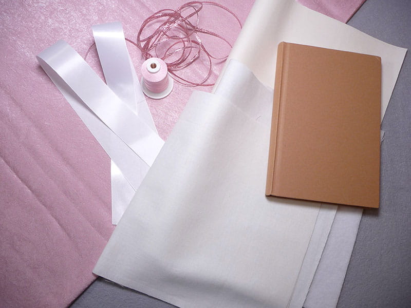 A picture containing paper, paper product, letter, envelope